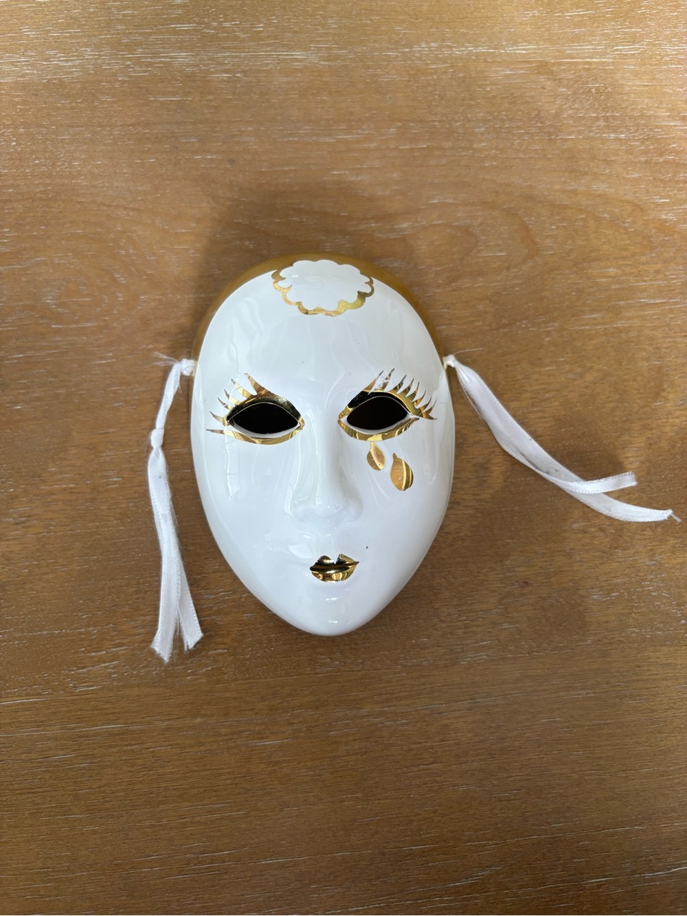 White and gold Venetian mask